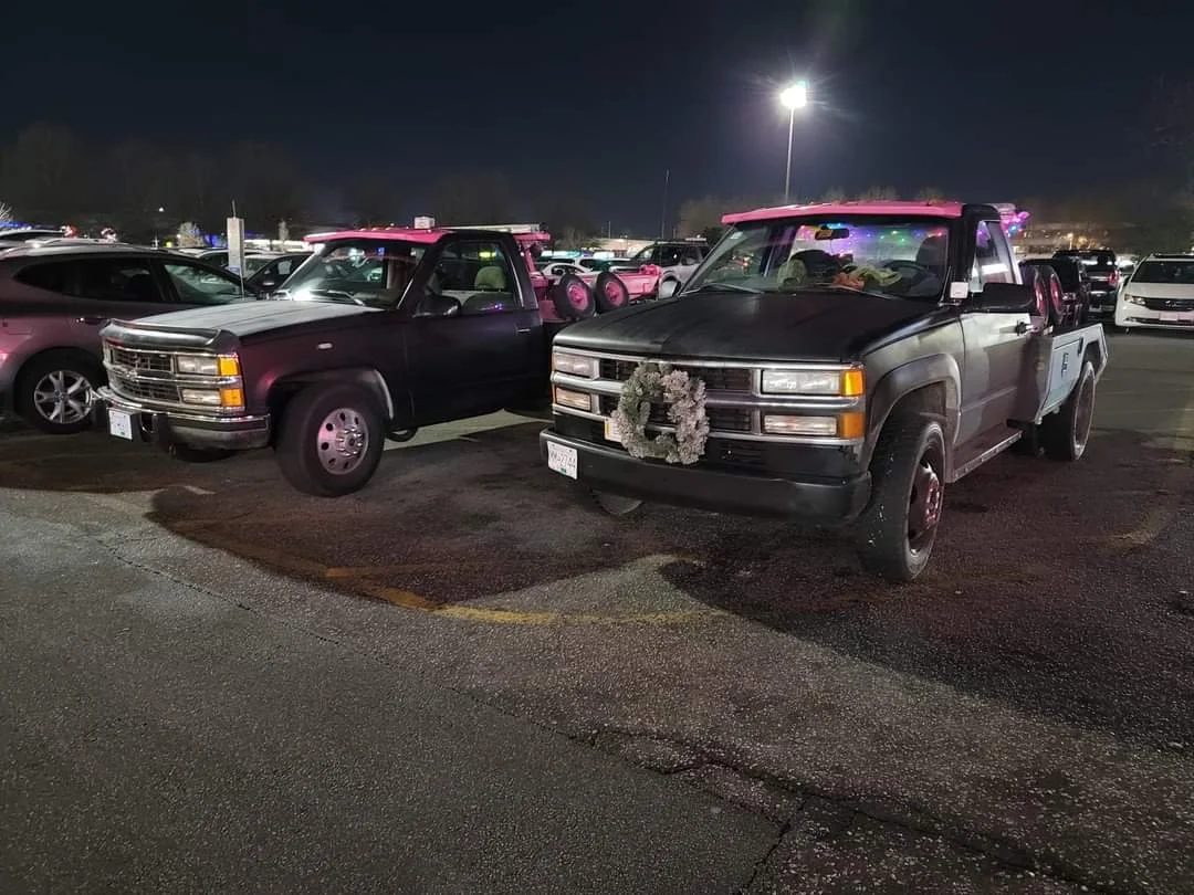 Jonny's Towing holiday decorated truck fleet